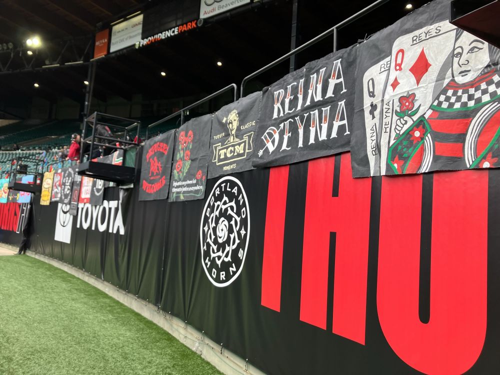 Photo of the front rail of the riveters section showing off all the rail banners. 