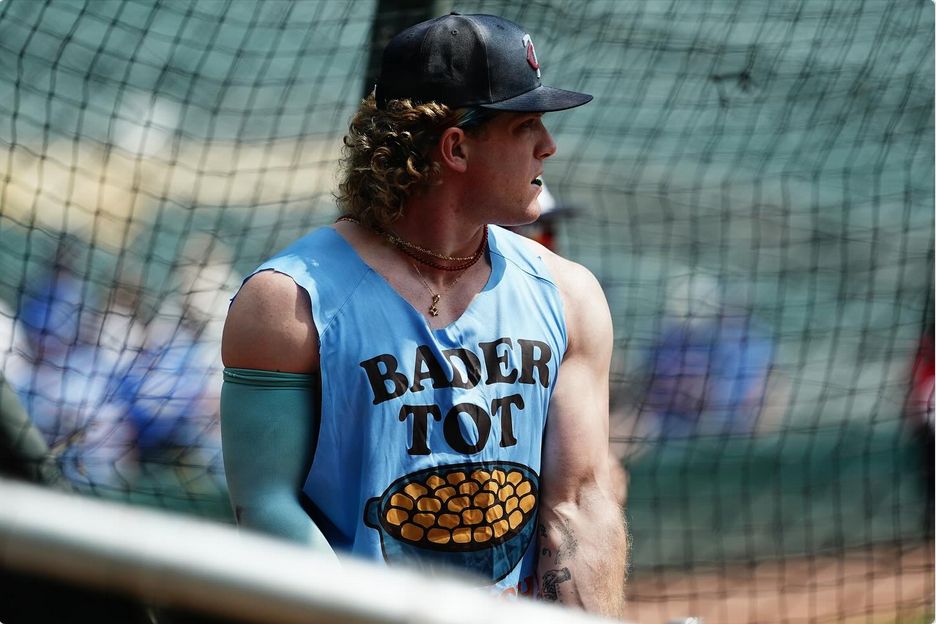 Harrison Bader in a "Bader Tot" crop top with cut off sleeves. He's wearing a choker. 