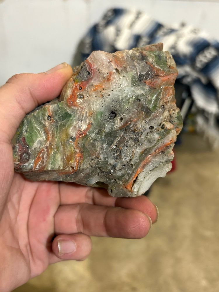 I have my ideas but i want to know if you can identify this “rock”. It has completely random bands of varying colors and the only rock quality I’ve found is that it is vaguely rock shaped