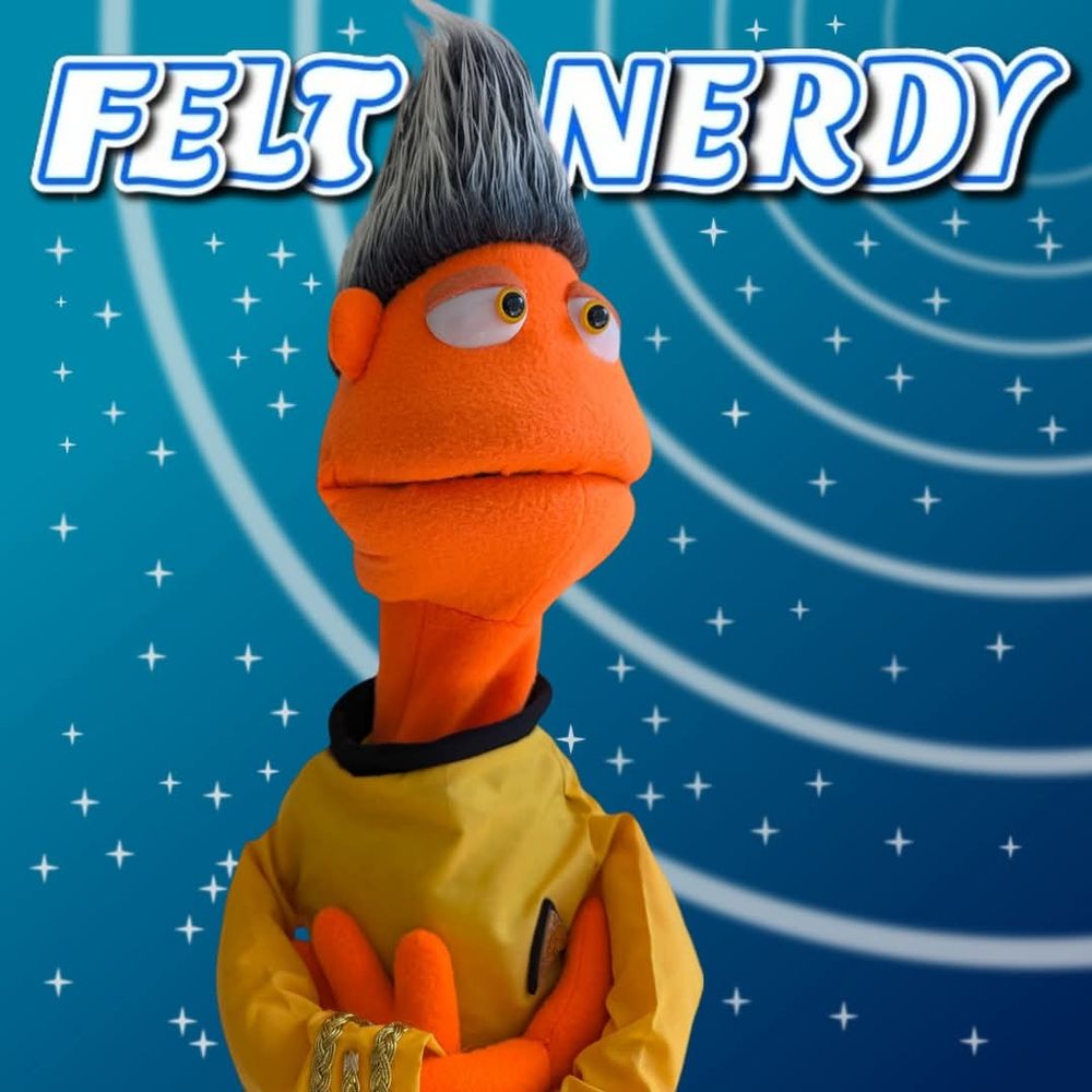An orange puppet with tall hair wearing a gold Starfleet uniform.

The text reads Felt Nerdy.