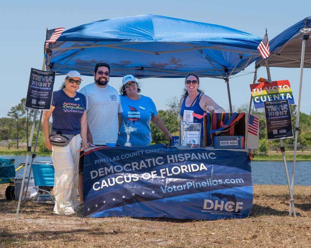 Pinellas Democratic Hispanic Caucus team sharing resources and voter info.