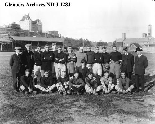 A group of Edmonton football players gather at Diamond Park before their exhibition game vs Hamilton in Sept 1921.