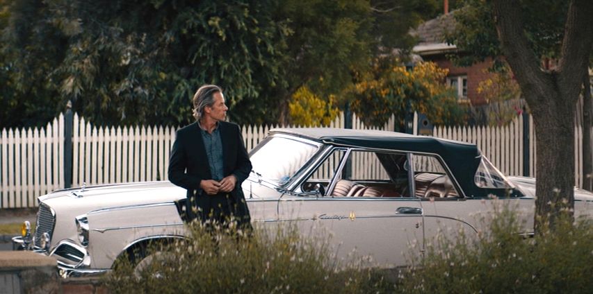 Guy Pearce as Jack Irish with another sweet classic car because terrible things happened to his Studabaker and it's all part of the zany plot of this great Aussie show you've been missing. 