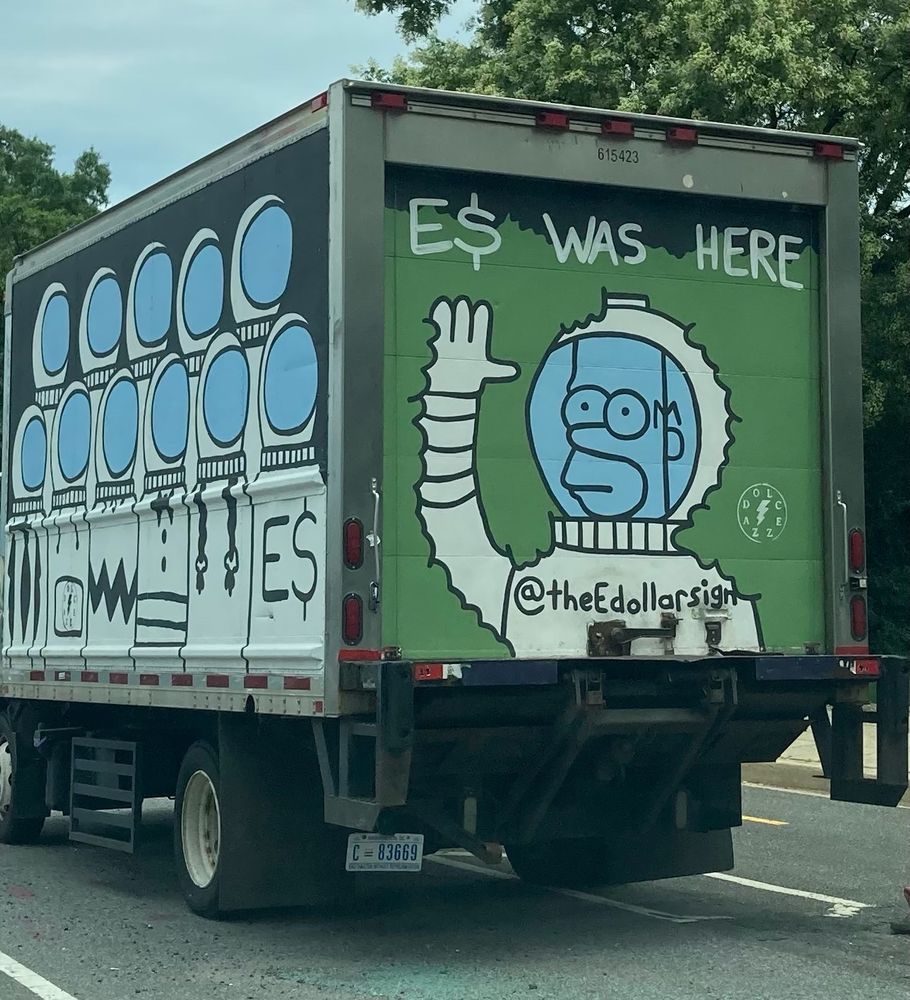 astronaut homer painted on box truck
