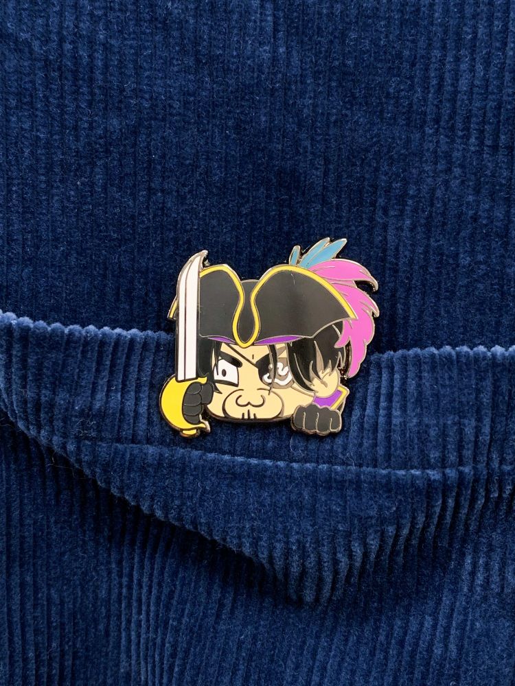 Photo of enamel pins of Majima Goro as a pirate