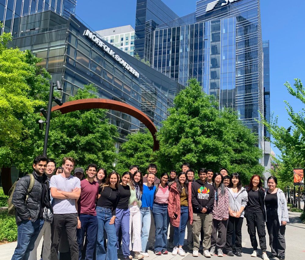 Georgia Tech MS in Supply Chain Engineering students stand in front of the Atlanta headquarters for the Norfolk Southern railroad.