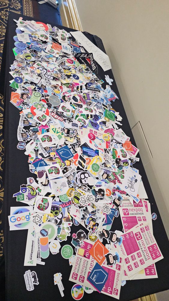 Table overflowing with stickers.