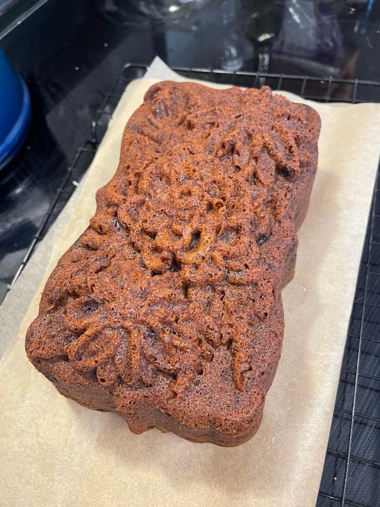 Banana bread with a flower design from the loaf pan