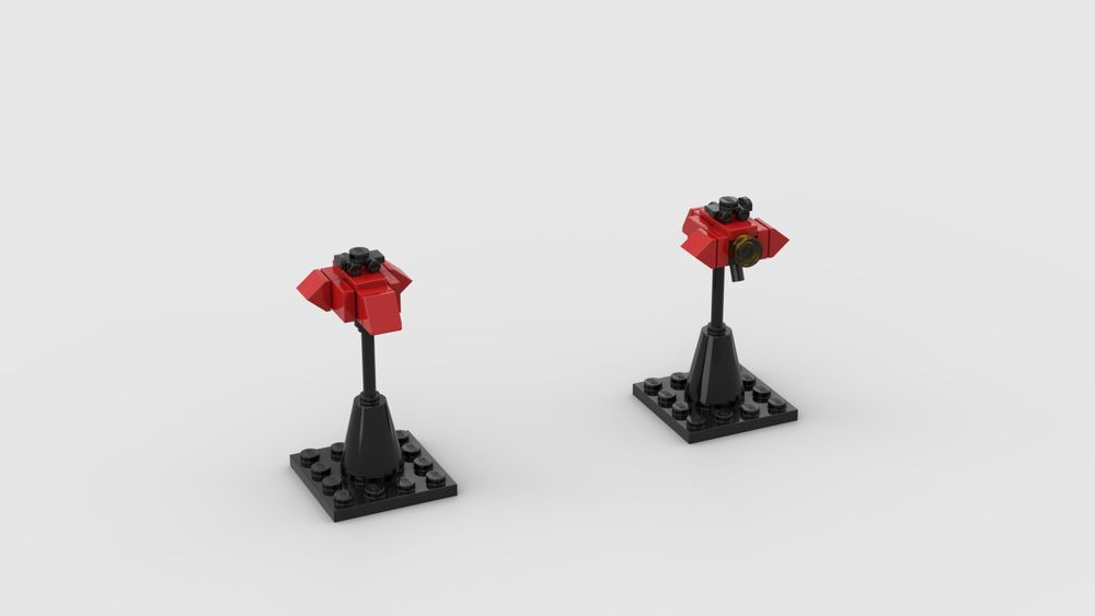 Front and back renders of a LEGO spaceship on a flight stand. The ship has angular red armor over a black structure, and a small dorsal turret.