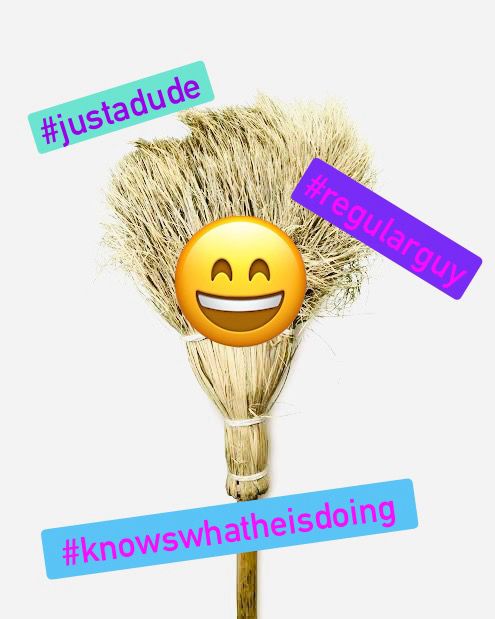 A picture of a broom made to look like Rhys darbys latest thirst trap in order to illustrate how me, a lesbian, views said thirst traps. Hashtags included on image as follows: #justadude #regularguy #knowswhatheisdoing