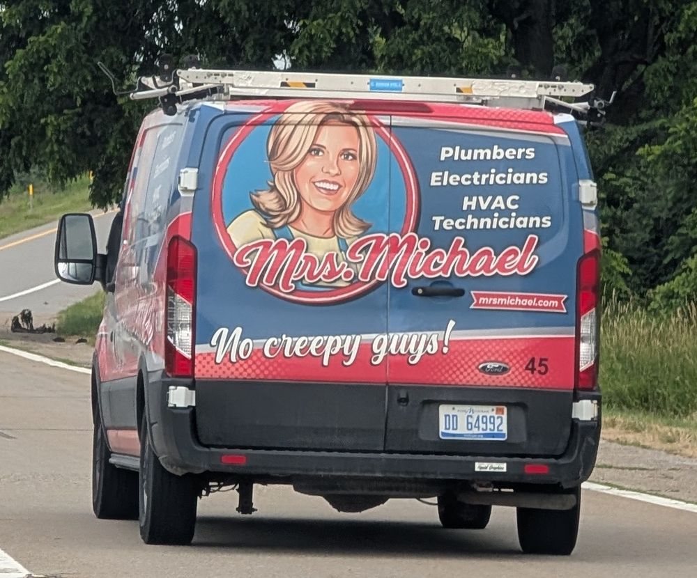 A truck for a HVAC company with the tagline "No creepy guys"