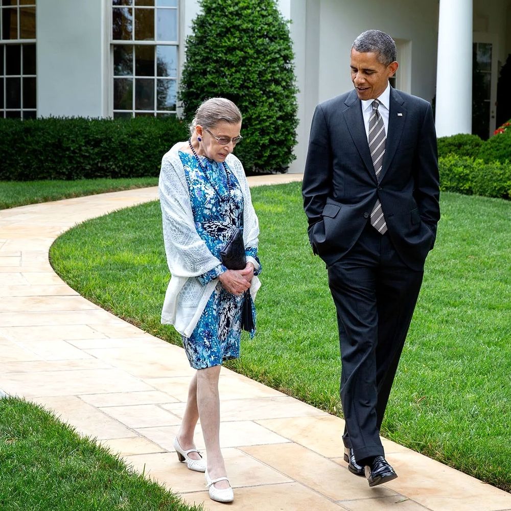 A photo of Justice Ruth Ginsburg and President Obama deep in conversation outside the White House