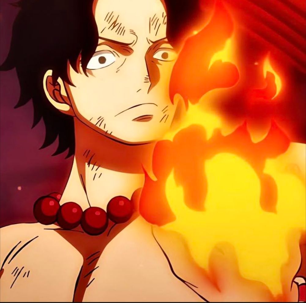 Ace gazes into the fire of his palm, his brow furrowed but eyes curious. He's looking a little beat up, but still alive and well. His raven hair is in short waves framing his face. 
