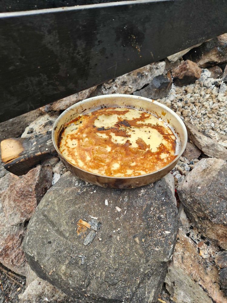 Cooking some thin pancakes (lätty) on the campfire! So good.