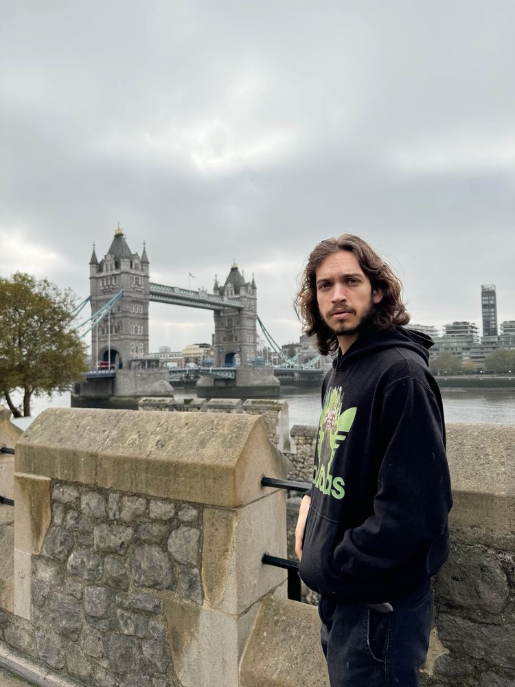 Sydney said “Joey look dramatic at me” and next thing you know I looked dramatic in front of the tower bridge. Goated pic too