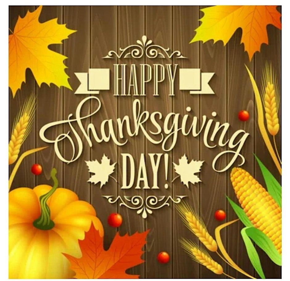 A slogan of 'Happy Thanksgiving' on a wooden background surrounded by pumpkin, sweetcorn, wheat and maple leaves