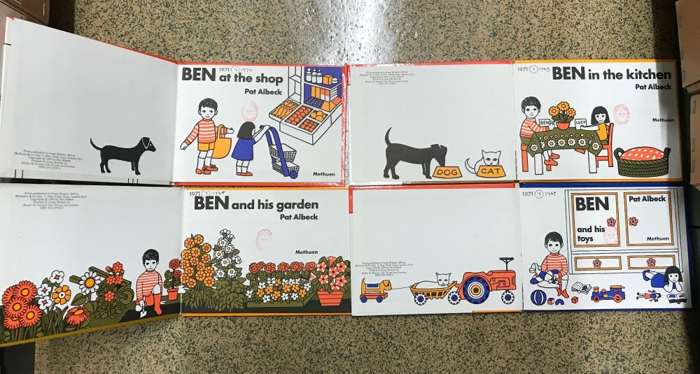 1970s early readers for kids, open to their title pages: Ben at the shop, Ben in the kitchen, Ben in the garden, Ben and his toys. Stylised line drawings with black outlines filled with 70s shades of brown and orange. Quite Dick Bruna. 