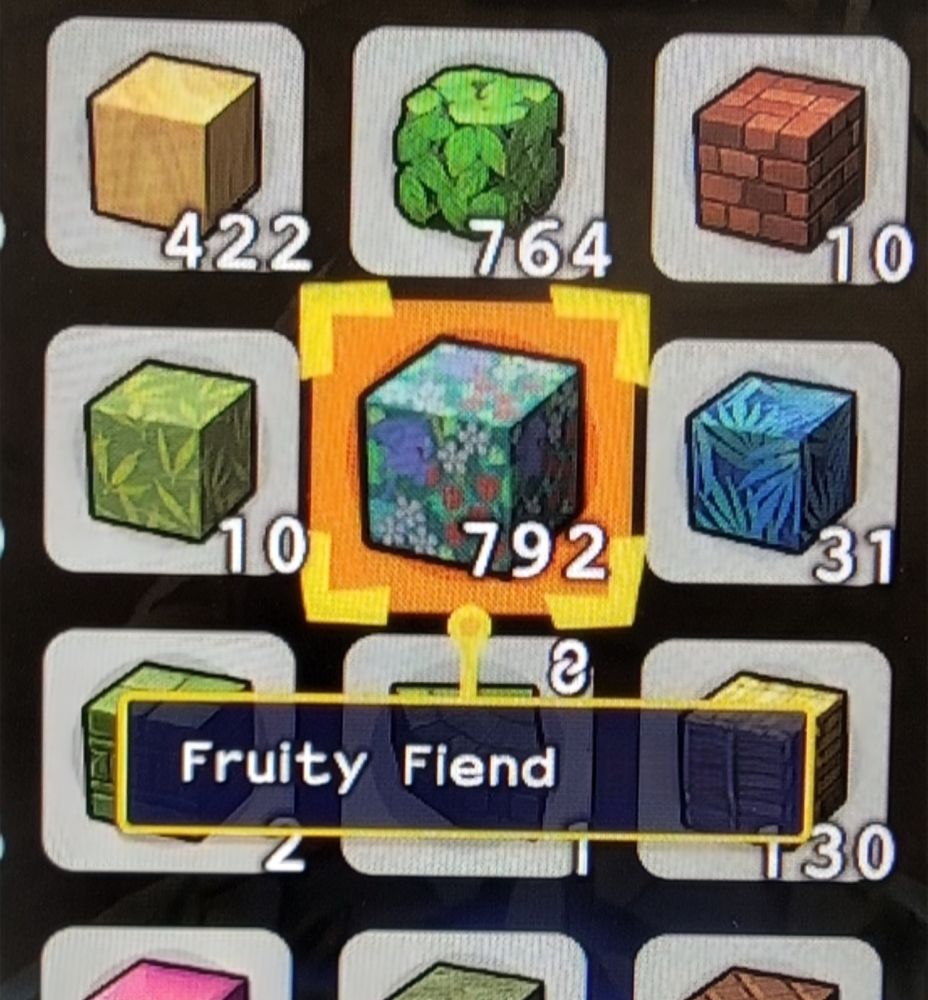 Screenshot of the game Dragon Quest Builders 2 showing a lost of blocks. The game cursor is hovering over a block named "Fruity Fiend" 