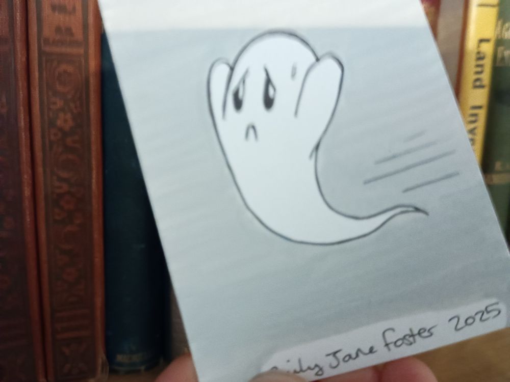 A photograph of a blurry moving ACEO sized illustration in front of a bookshelf. The ghost has it's arms in the air and looks as though it is worriedly rushing. Art by Emily Jane Foster.