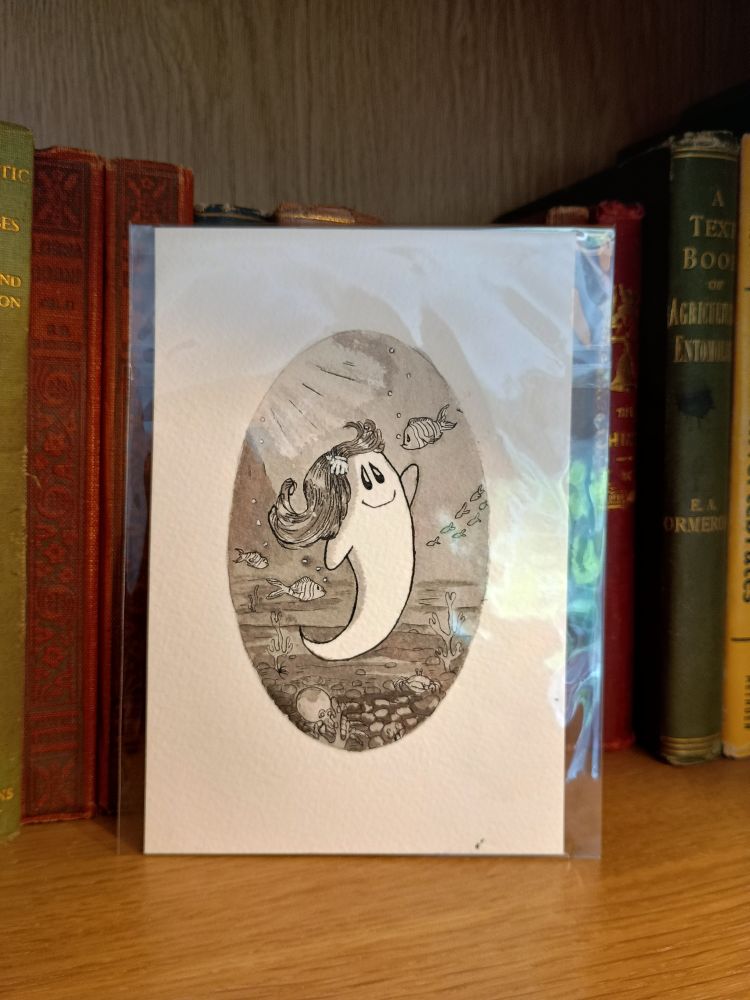An original A6 black and white ink illustration in cellophane on a bookshelf. A smiling ghost reaches out to fishes underwater. Initialled EJF.