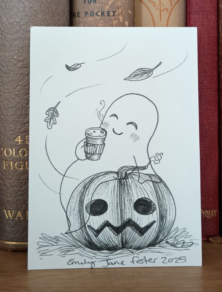A photograph of an ACEO sized black and white ink illustration of a happy ghost reclining on a Jack-o'-lantern with a coffee cup. Leaves are blowing around the character. Art by Emily Jane Foster.