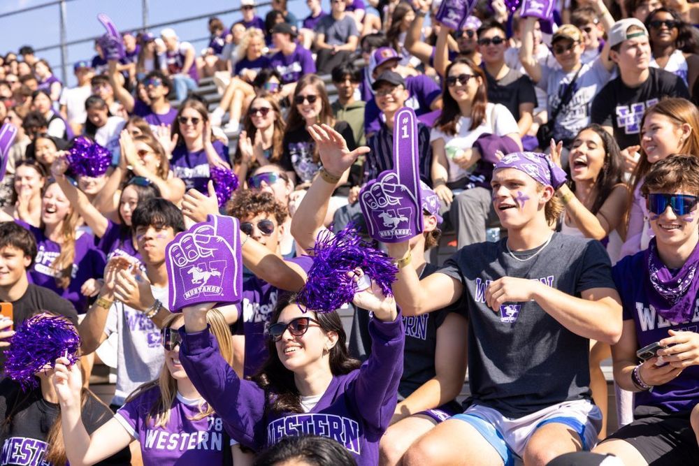 The crowd celebrates at the Western Mustangs football game on Sept. 27. Western beat McMaster 52-22 during the annual Homecoming game. (Frank Neufeld)