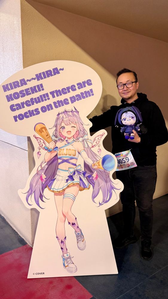 Biboo next to Biboo next to a guy