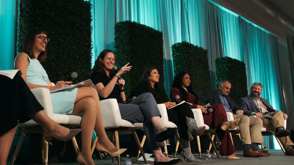 photo of PIE Network advocates on stage at PIE Network Summit 2025.