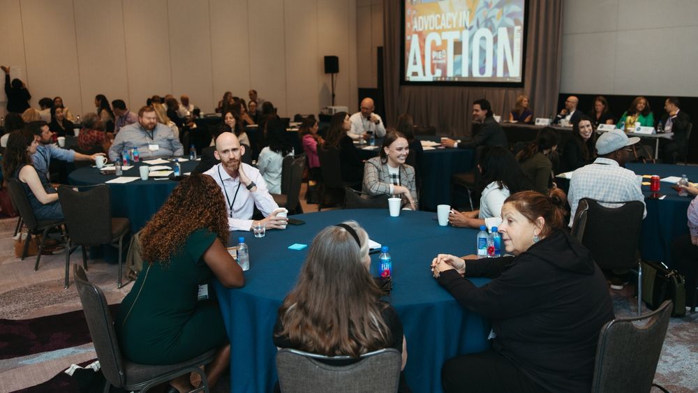 photo of PIE Network advocates in discussion