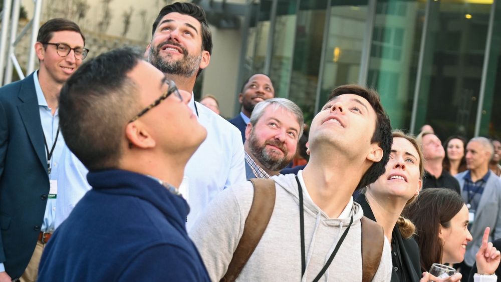 image of PIE Network members looking up at the sky