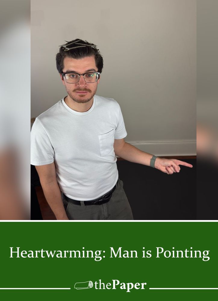 AnyAustin's picture where he is pointing to the right turned in to a parody of the Onion's graphics.  His photo is presented over the text "Heartwarming: Man is Pointing" over a fake logo for "the Paper".