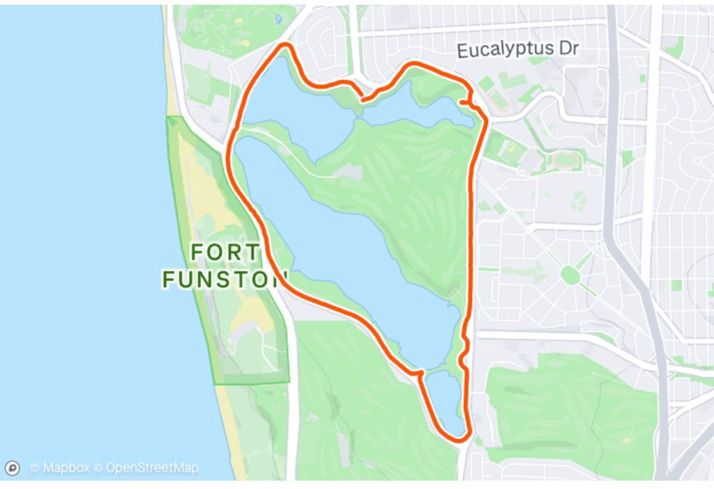 A map showing Lake Merced in SF with a trail around it as the path walked. 