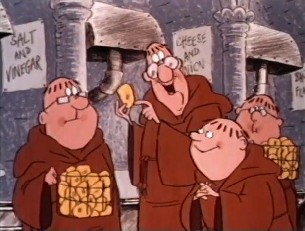 Father Abbot giving Brother Benjamin a tour of the church's crisp factory