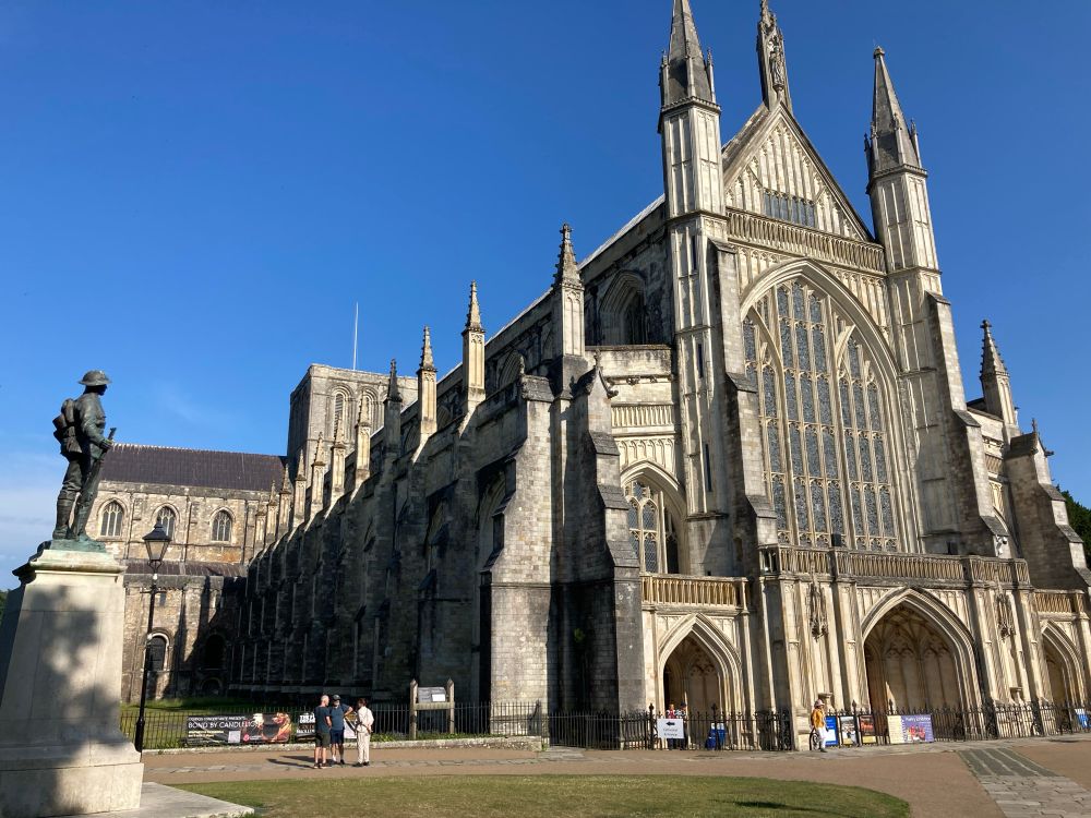 Winchester cathedral under a very clear blue sky
