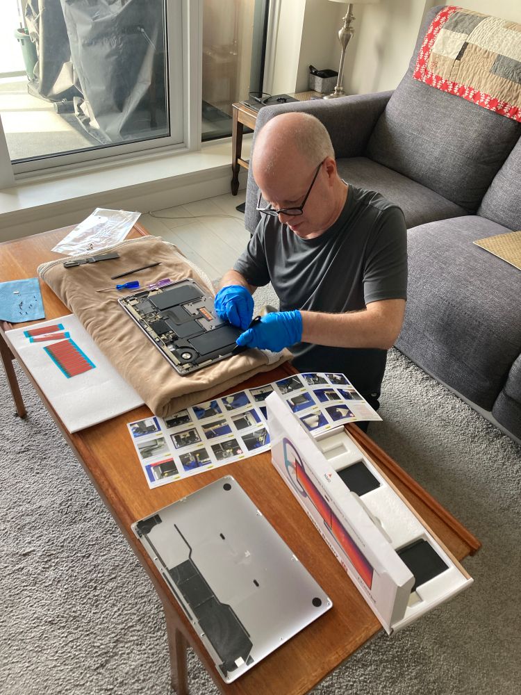 Me taking apart my MacBook Air on my coffee table
