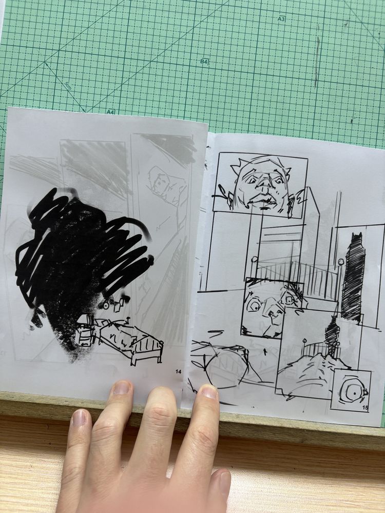 Printed spread of some comic thumbnails. The main character is awoken by an unknown shadowy entity 