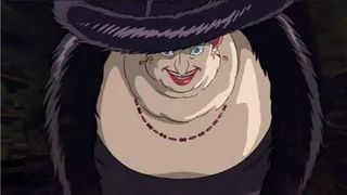 The Witch of the Waste from Howl's Moving Castle (Studio Ghibli) flying towards the camera with malicious glee on her face.