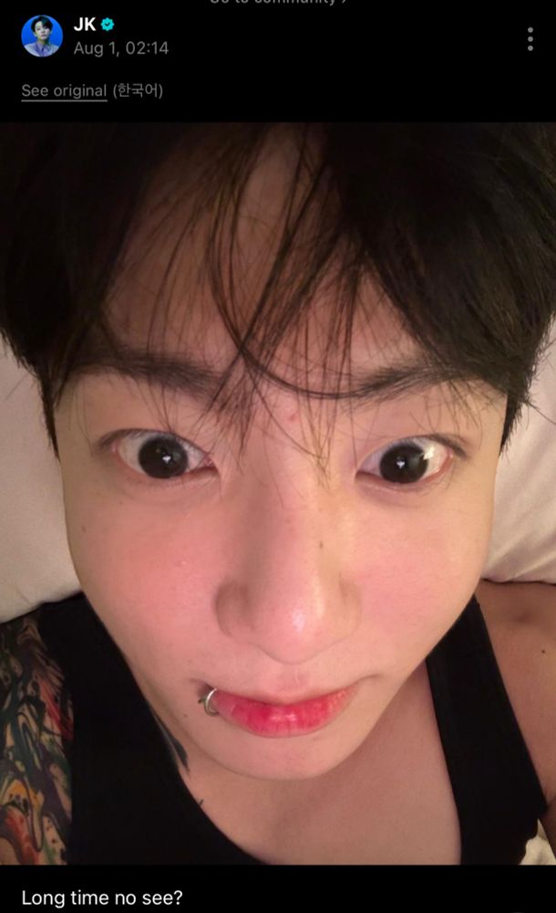Jk weverse selfie text reads: long time no see? 