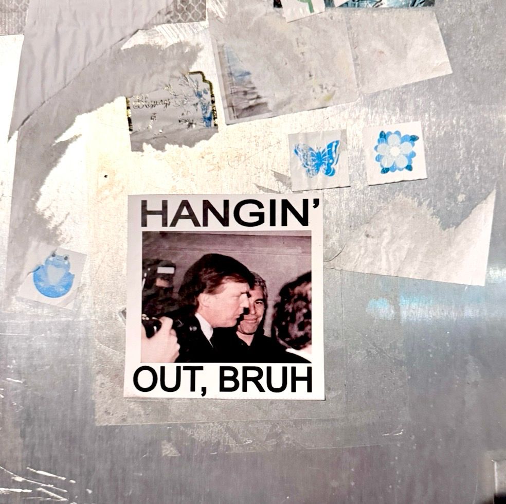 A sticker on a metal box has a picture of Donald and Jeffrey, and it reads:

HANGIN'
OUT, BRUH 