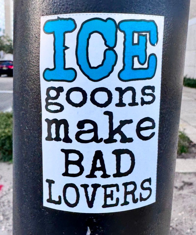 Sticker on pole reads: ICE goons make BAD LOVERS