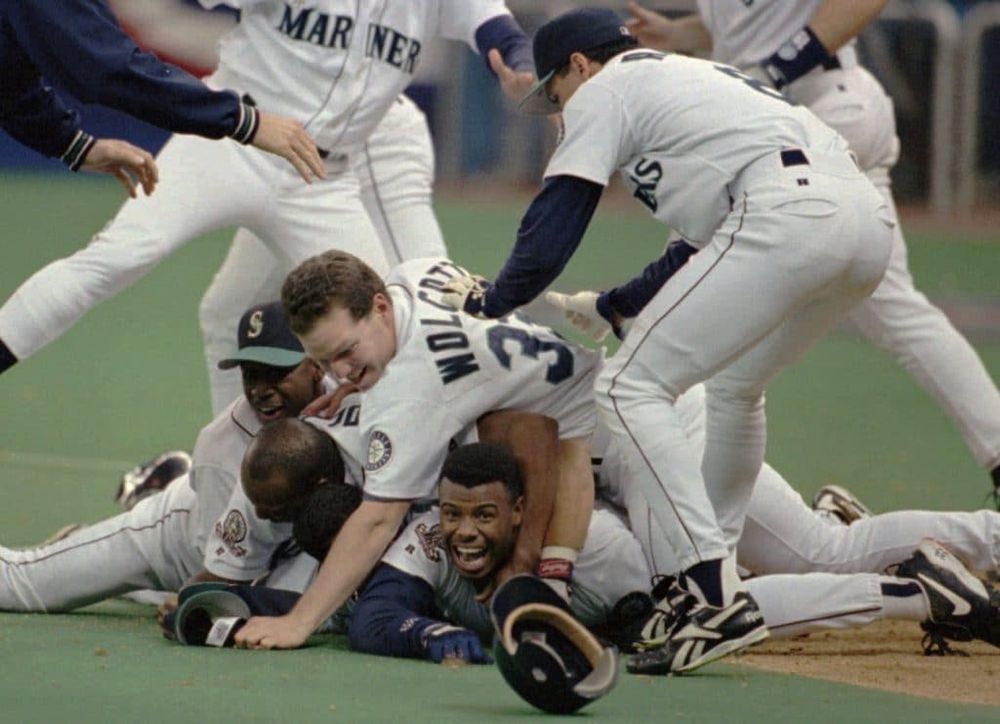 An image of several Mariners players celebrating the 1995 American League wildcard series victory over the Yankees