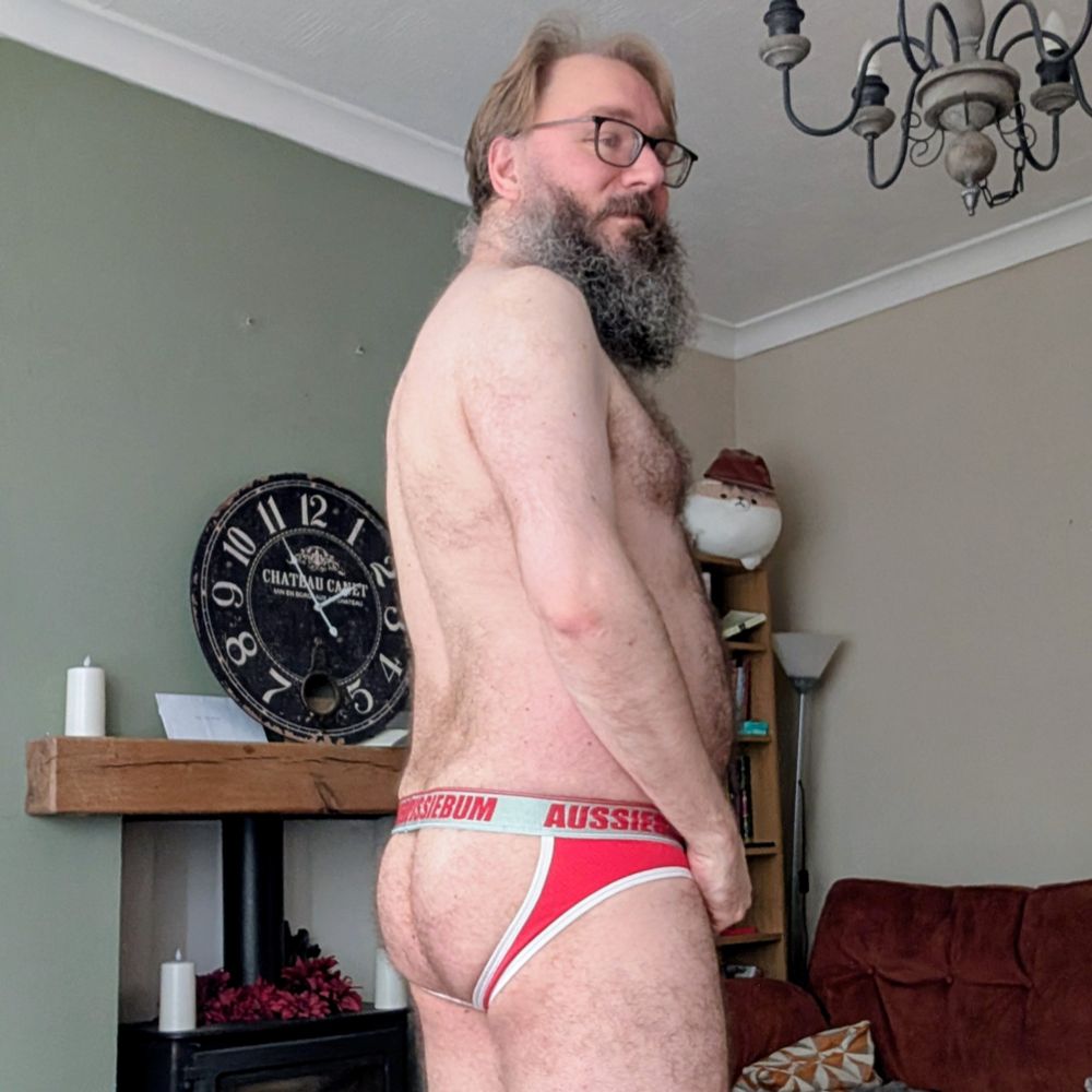 Side view in jock showing off of some butt cheeks