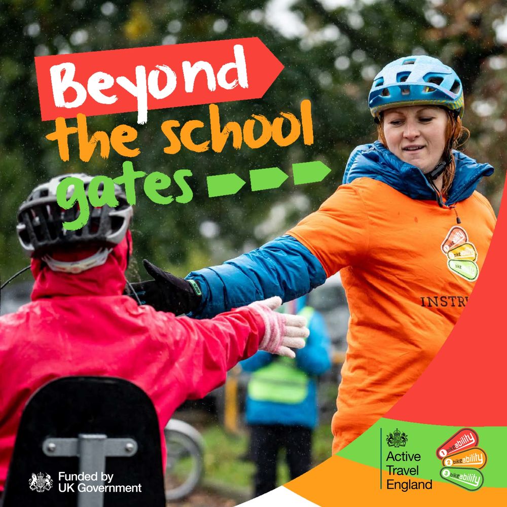Graphic for The Bikeability Trust's latest Impact Report. A cycling instructor in an orange shirt reaching out to a child in riding a hand cycle during an outdoor cycling lesson. Text reads: "Beyond the school gates". With logos for Funded by UK Government, Active Travel England, and Bikeability at the bottom.
