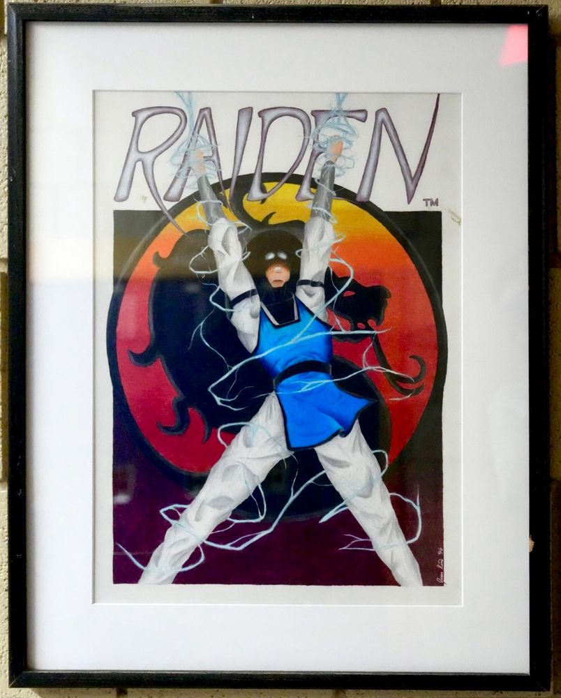 Hanging on a brick wall within a frame: Colored pencil art of Raiden, the character from Mortal Kombat, calling down a bolt of lightning through his upraised arms. Tendrils of electricity swirl around his body, and a large representation of the Mortal Kombat dragon logo looms in the background.