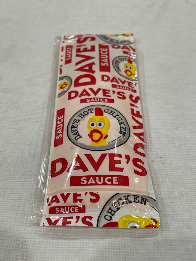 A packet of Dave's Sauce from Dave's Hot Chicken.