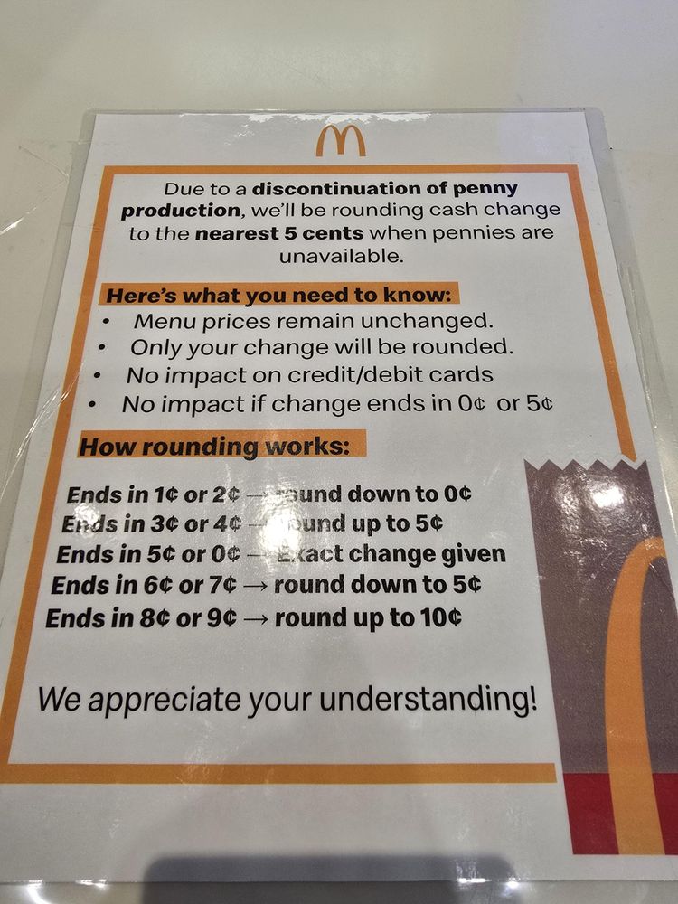 McDonalds sign announcing the discontinuation of the penny, along with standard situations adopted by every other country which has discontinued the penny, along with an explicit explanation of how rounding to the nearest 5c works