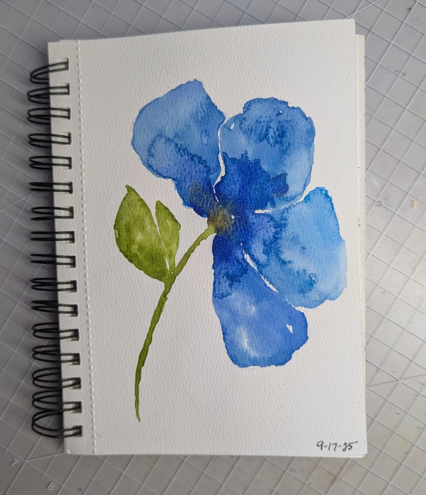 Blue watercolor flower with green stem two green leaves on the left side Blue watercolor flower with green stem two green leaves on the left side 