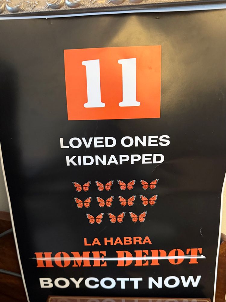 Protest sign reads 11 Loved Ones kidnapped in LaHabra. Everyone had a different city and number of kidnappers Peaceful demonstration at Home Depot in Torrance CA