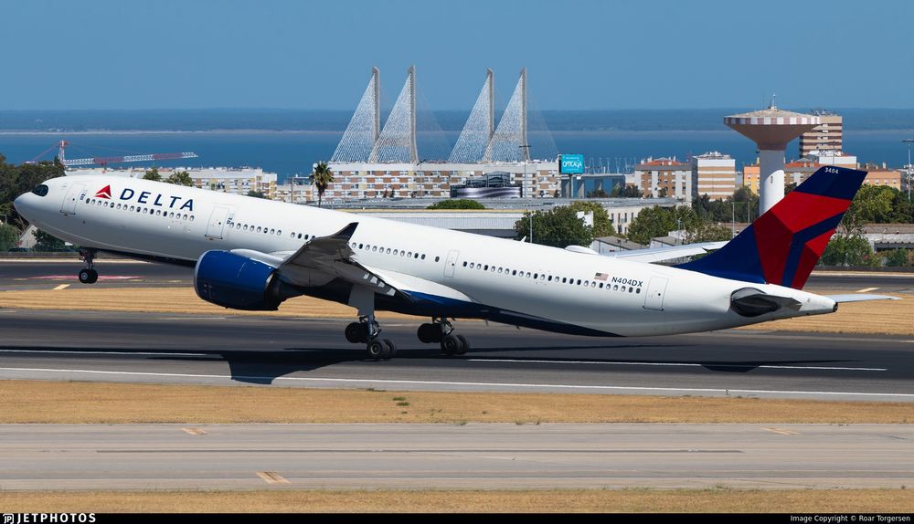 photo of airplane taking off with very computer-generated-esque shadows