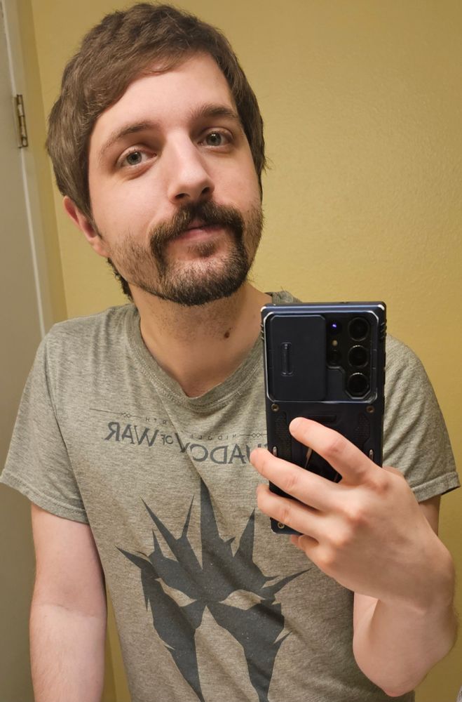 Just a picture of me about to shave my face while wearing a Lord of the Rings t-shirt.